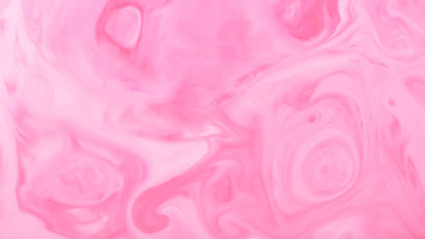 istock Light pink fluid art background. Blurred pink shapes on a liquid surface. Abstract wallpaper of soft pink shades 1398504757