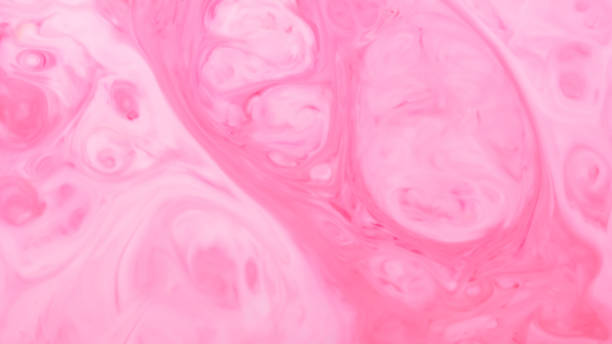 istock Light pink fluid art background. Blurred pink shapes on a liquid surface. Abstract wallpaper of soft pink shades 1398504769