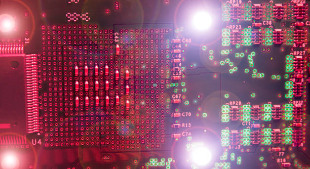 istock electronic plate illuminated with reddish light and with four points of light in the corners 1398507666