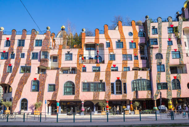 Historic green citadel building on the main street of Magdeburg Historic green citadel building on the main street of Magdeburg, Germany hundertwasser house stock pictures, royalty-free photos & images