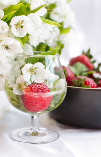 istock Red strawberries in a glass. Harvesting berries 1398510413