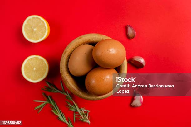 Top View Of Eggs Lemons And Garlic Ingredients Needed To Make The Rich Homemade Alioli Sauce Typical Spanish Sauce Stock Photo - Download Image Now