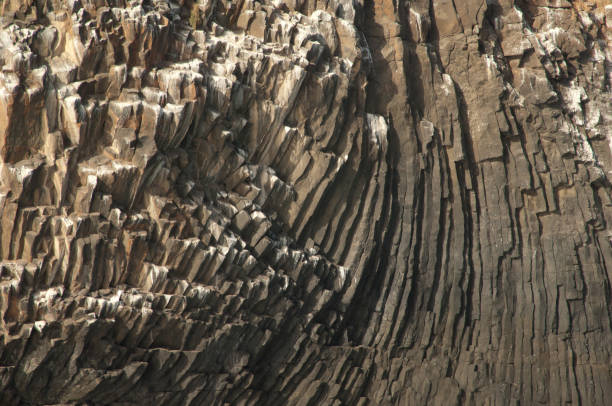 istock Rocky cliff with basalt columns in Sarpan Island. 1398510687