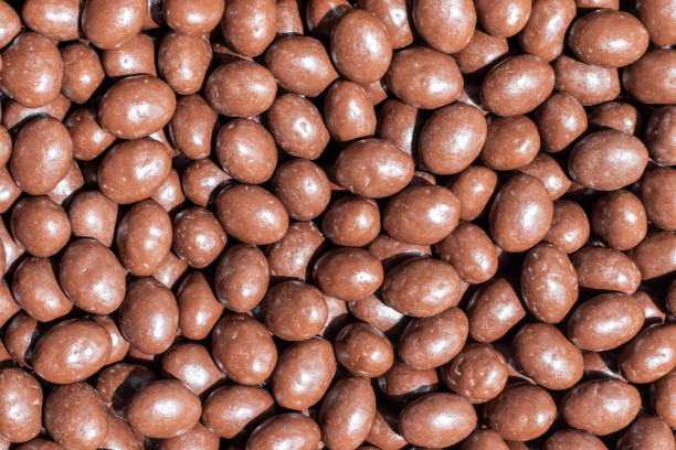istock Candies covered with milk chocolate. 1398517474