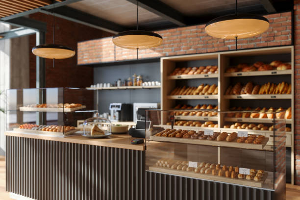 padaria interior. close-up view of bakery counter with freshly baked food and buns. - bakery - fotografias e filmes do acervo