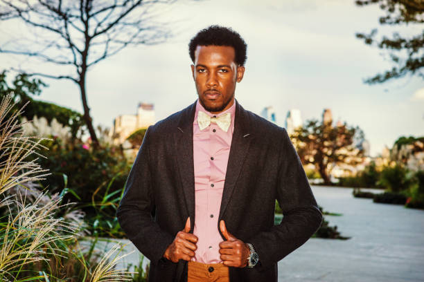 istock Young black man standing outdoors in New York City 1398519697
