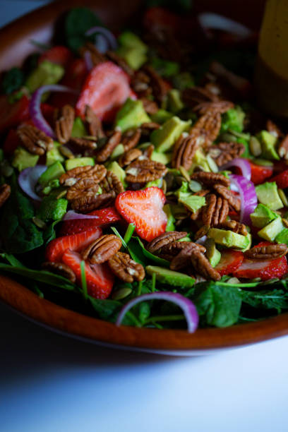 istock Fresh Summer Salad with Fruit in Wooden Bowl - Tall 1398520516