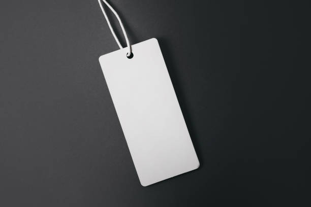 istock white tag on black background. Mockup, copy space for text, top view 1398520579