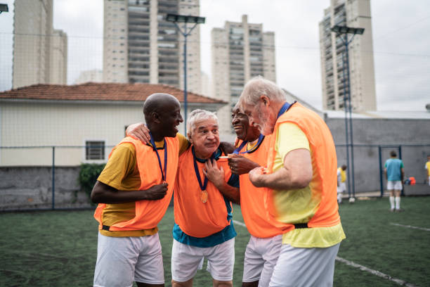 istock Men celebrating winning a match on the soccer field 1398521678