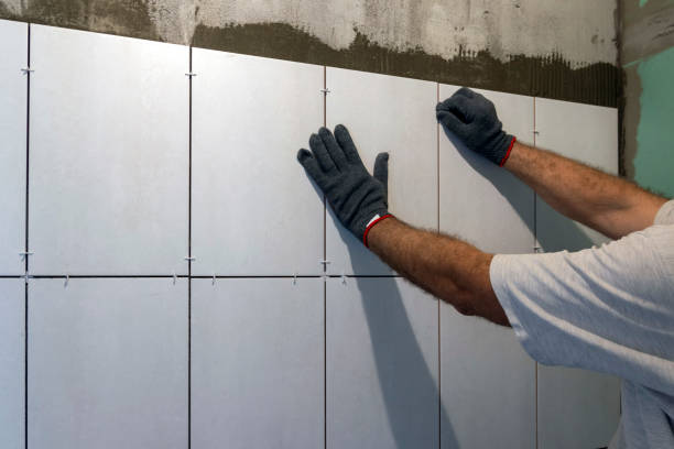 istock ceramic tile laying. Tiles, installation of ceramic wall tiles on adhesive 1398523853