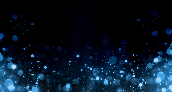 abstract particle bokeh with dark blue background
