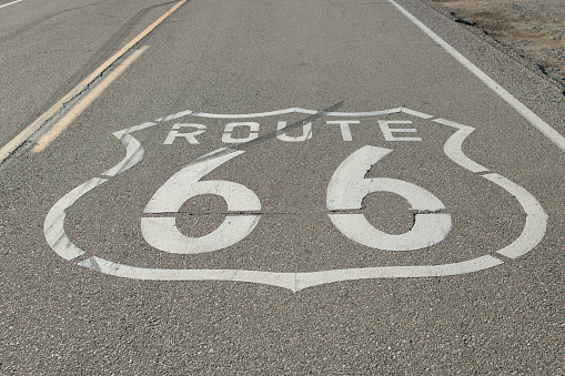 Close-up photograph of Route 66 shield in Amboy, California. Photographed on historic Route 66.