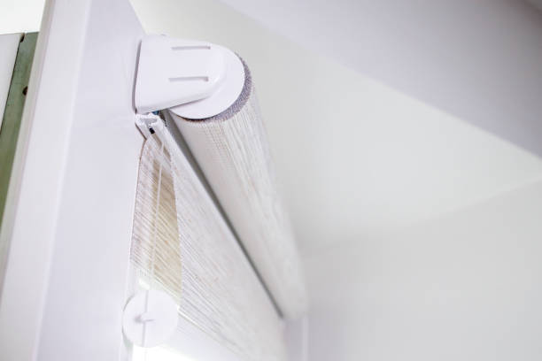 istock Window roller duo system day and night. Close up on roll curtains indoor. 1398528783