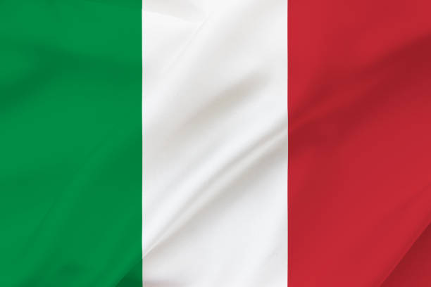 istock Italy flag on waving silk background. 1398531420