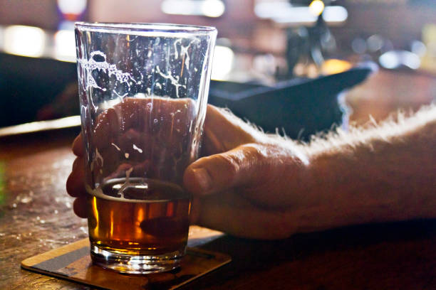 istock Drinking Beer At the Bar 1398539180