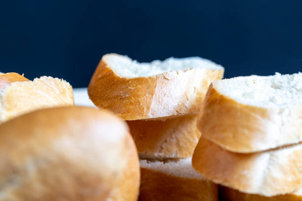 istock wheat baguette cut into pieces on a cutting board 1398540150