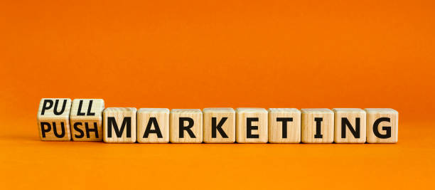istock Pull or push marketing symbol. Turned wooden cubes and changed concept words Pull marketing to Push marketing. Beautiful orange background. Business and pull or push marketing concept. Copy space. 1398541120