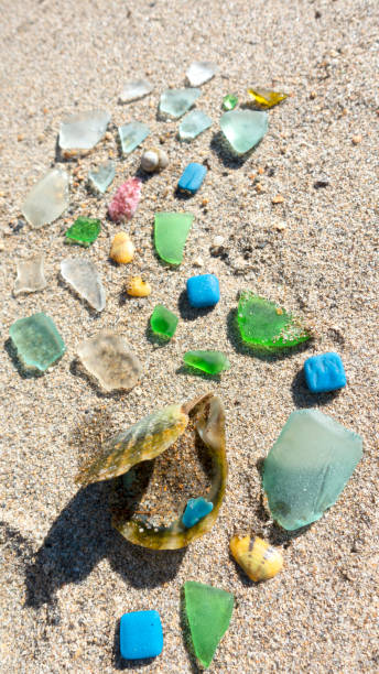 istock Crystals and seashells at the sandy beach. 1398543025