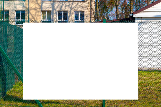 istock Blank white advertising banner on the fence 1398545722