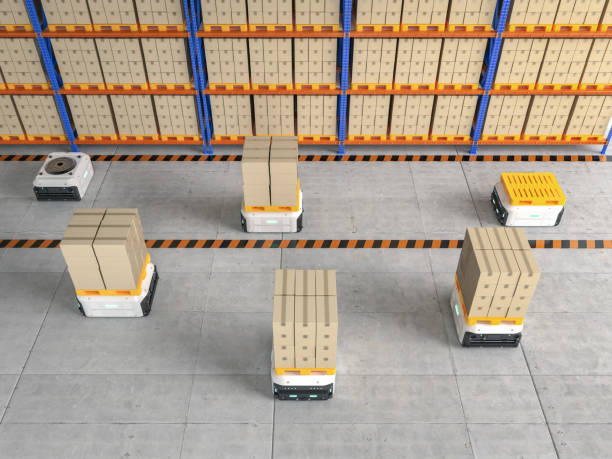 istock Automation warehouse management with robot carry cardboard box 1398554075
