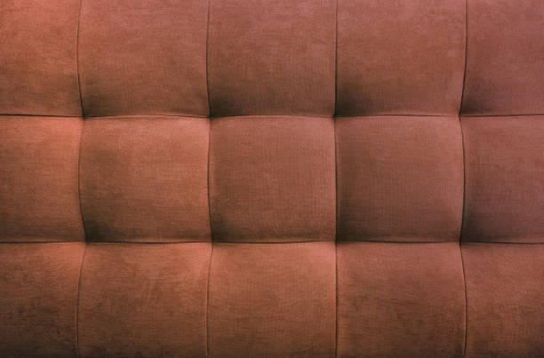 istock Brown suede leather background, classic checkered pattern for furniture, wall, headboard 1398554315