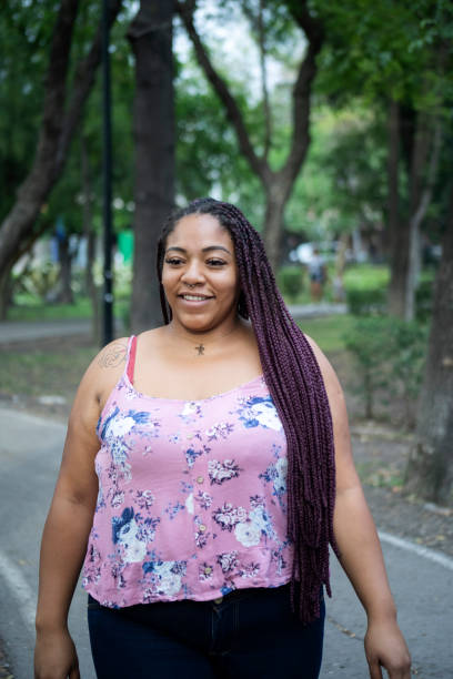 istock lgtb woman in the park 1398555567
