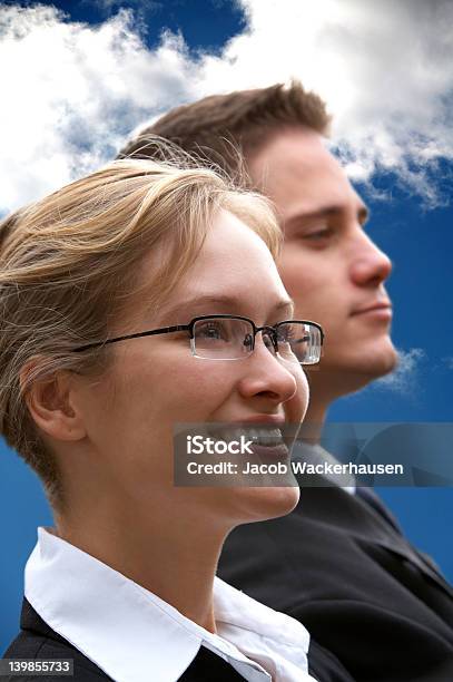 Young Business Rivals Looking In Different Directions Stock Photo - Download Image Now