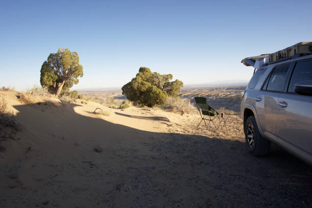 istock Overlanding vehicle parked in scenic campsite 1398558806