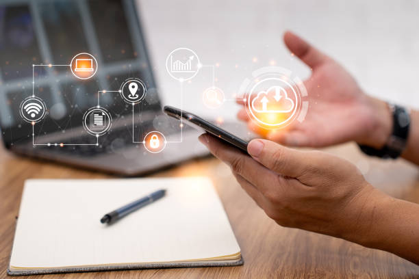 istock Document management and technology concept, Close up Hand Businessman use smartphone Searching from data storage technology online use a laptop computer with icons on virtual screen 1398562682