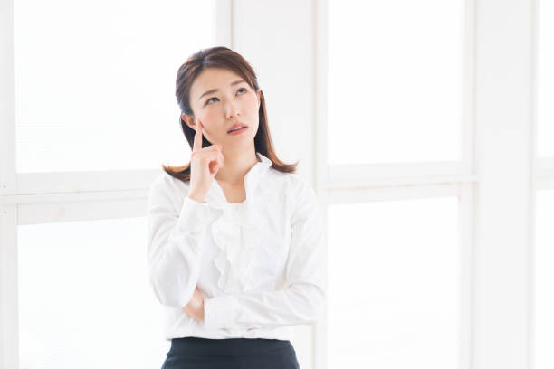 istock young attractive asian businesswoman,think 1398562914