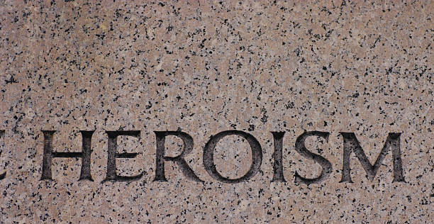 istock Word Heroism Carved in Gray Granite Hero 139856511