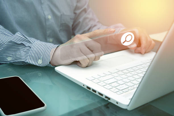 istock businessman searrch online via internet technology 1398567886