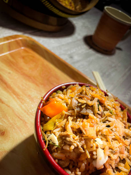 istock a bowl of Spices Fried Rice with Vegetables, fried eggs, noodles 1398570142