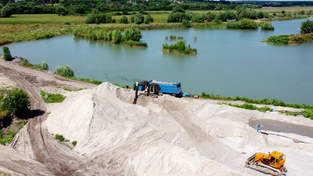 istock Aerial drone view flight over sand mining. Sand quarry. Top view. 1398570509
