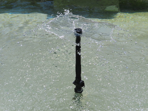 Water fountain spray with slow shutter
