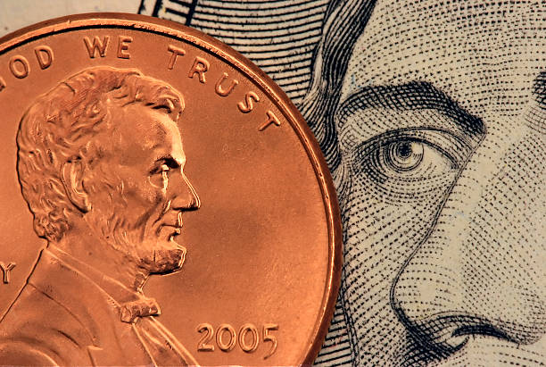 Penny on a 10 Dollar Bill stock photo