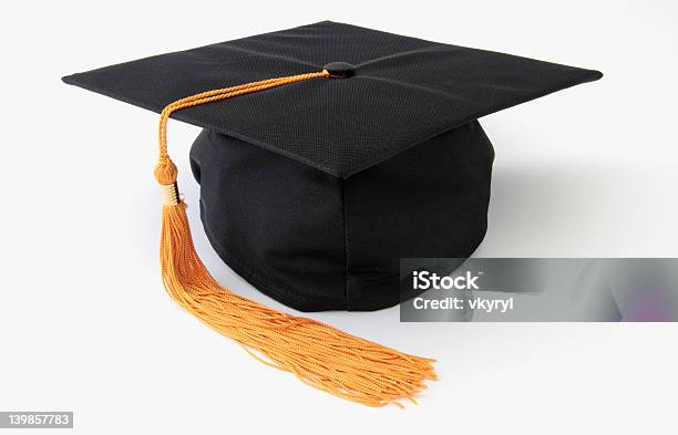 Graduation Cap With Yellow Tassel Isolated On White Stock Photo - Download Image Now