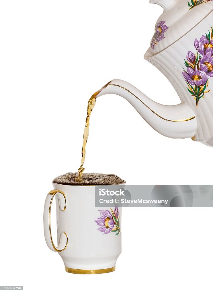 Fill to the brim Topping up some tea. At The Edge Of Stock Photo