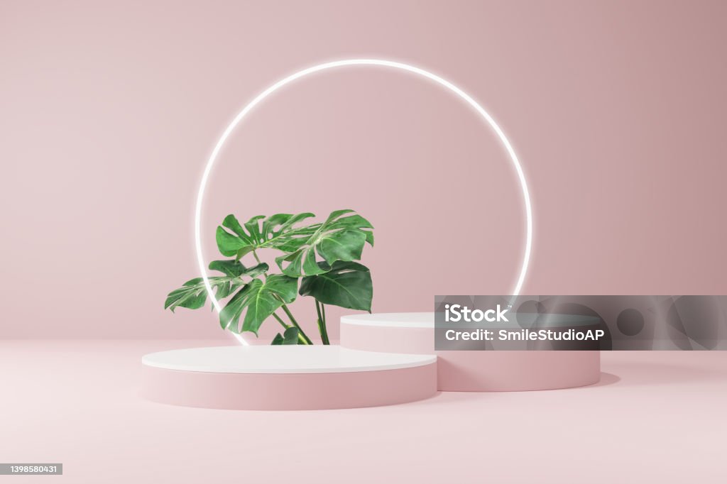 Summer cosmetic products stand with green leaf geometric platforms. Summer cosmetic products stand with green leaf geometric platforms. 3D summer product background showing a pedestal scene. 3D rendering background with podium. Stage on 3D pink summer display podium. Podium Stock Photo