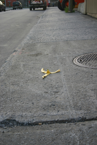 A classic comedy banana skin on the sidewalk of a  Montreal street.