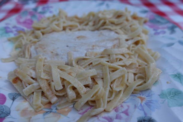 istock Tagliatelle cooked in cream served with turkey fillet 1398583911