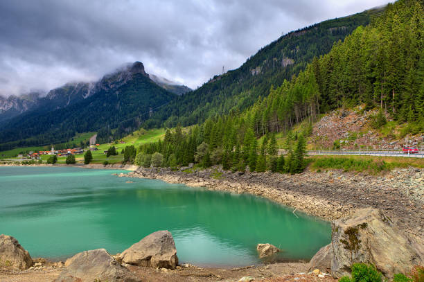 istock Small alpine lake in Switzerland. 1398586636