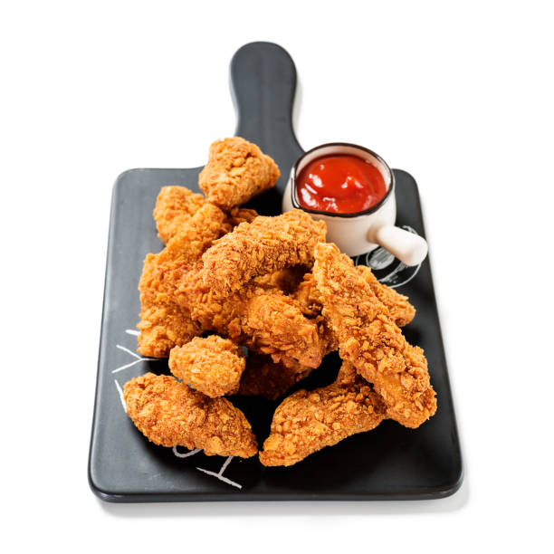 istock Delicious crispy fried breaded chicken breast strips 1398588673