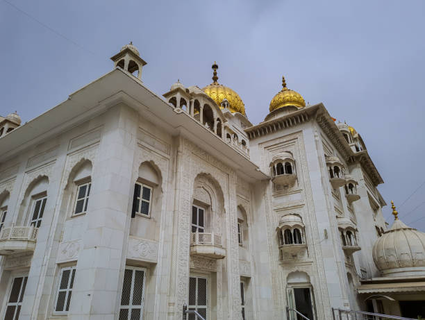 istock isolated gurudwara building with golden dome and flat sky at morning from different angle 1398592403