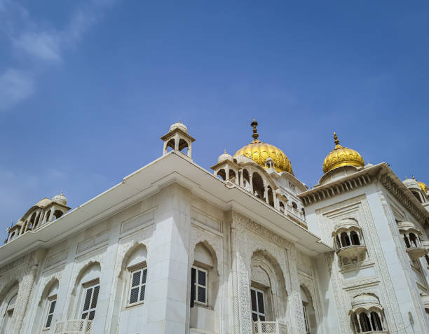 istock isolated gurudwara building with golden dome and flat sky at morning from different angle 1398592406