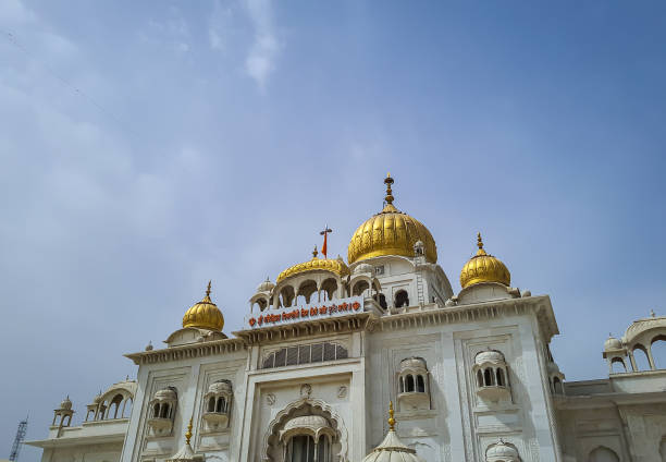 istock isolated gurudwara building with golden dome and flat sky at morning from different angle 1398592670