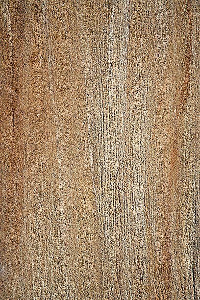 textura de parede de arenito - etching tan stone textured imagens e fotografias de stock