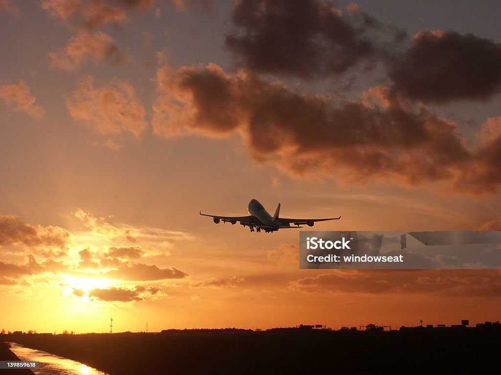 Sunrise climb Leaving for a vacation at Sunrise. Aerospace Industry Stock Photo