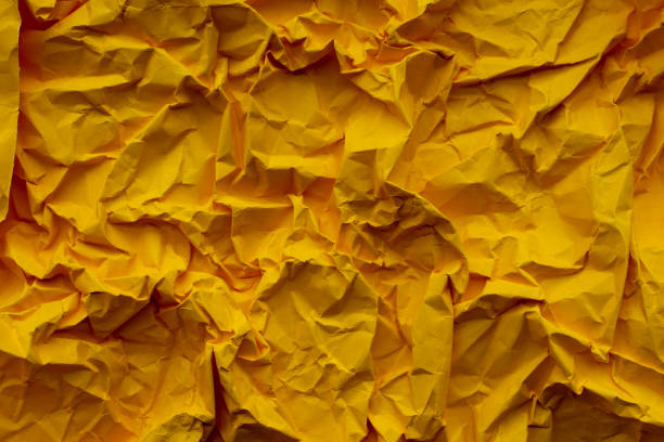 istock Crumpled real vivid paper  background texture. 1398596570