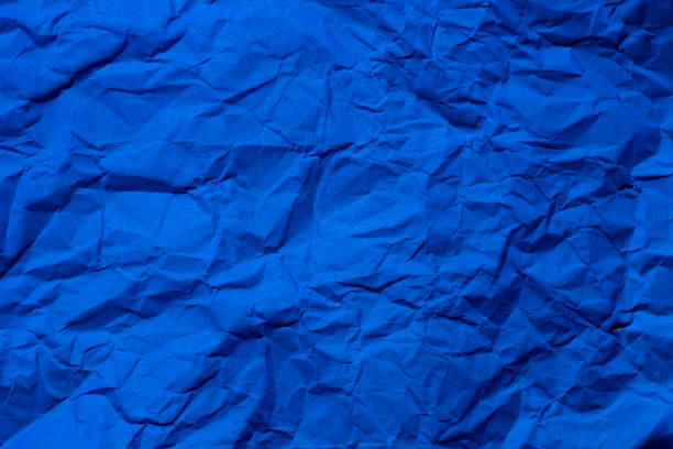 istock Crumpled real vivid paper  background texture. 1398596571